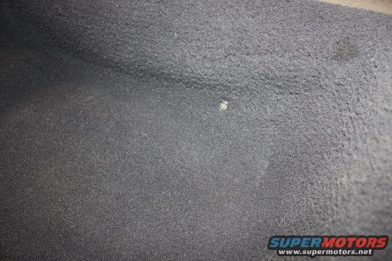 small burn hole on driverside rear