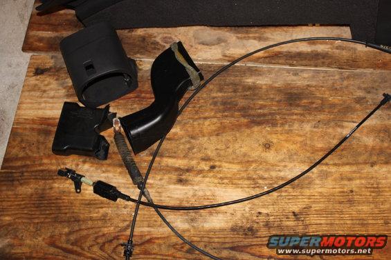 floor shifter cable
floor interlock cable
front and rear a/c duct work
steering column shroud (OEM 2004 mercury marauder)