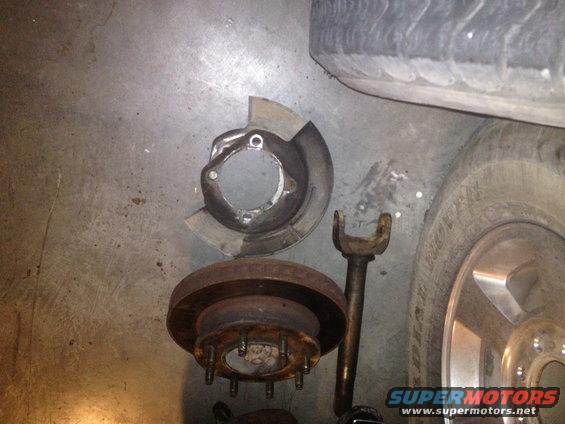 Brake rotor and dust shield on concrete floor