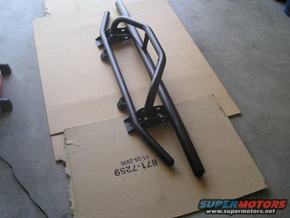 Black metal side steps on cardboard, with part number 871-7259 visible