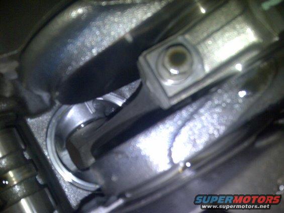 Close-up of engine connecting rod and piston