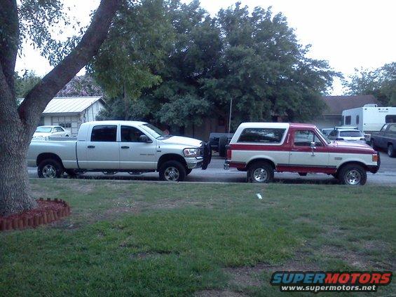 1989 Ford Bronco, red and white, side view