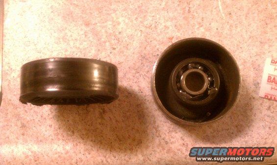 Pulley with worn rubber and a separate pulley housing with a bearing inside