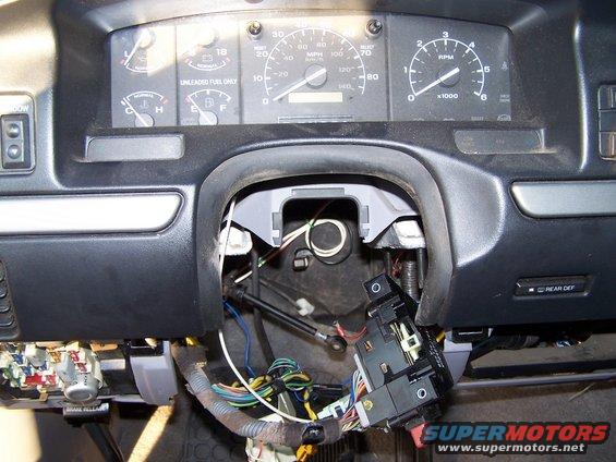 1995 Ford Bronco dashboard interior showing exposed steering column and wiring harness