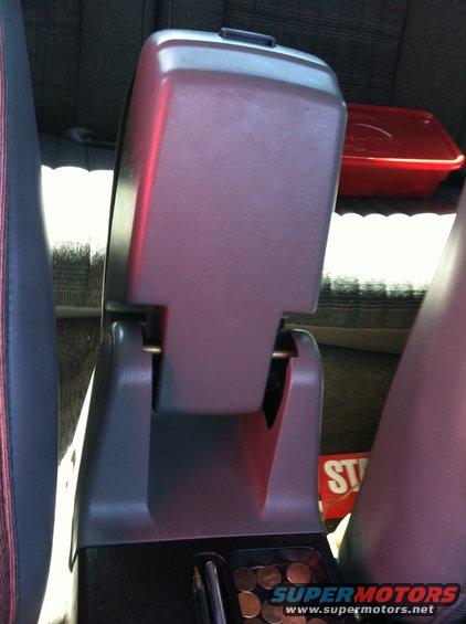 1989 Ford Mustang interior center console armrest with coin holder and red storage bin