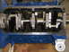 1967 Ford Mustang - Close-up view of an engine block's internal components, including the crankshaft and connecting rods.