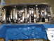 1967 Ford Mustang - Close-up view of the internal components of an engine, showing the crankshaft and connecting rods.