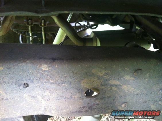 Undercarriage view of vehicle frame and suspension components