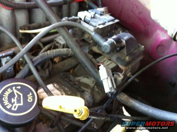 Old coil and very grimey valve cover.
