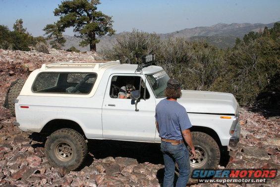 White 1978 Ford Bronco on rocky terrain