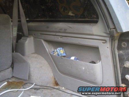 Interior storage compartment with items inside