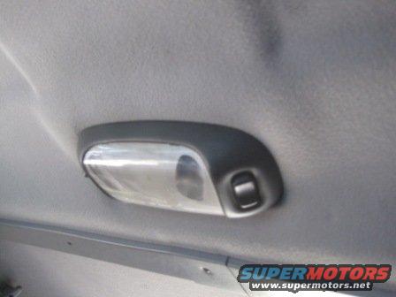 Interior dome light assembly on a vehicle's headliner