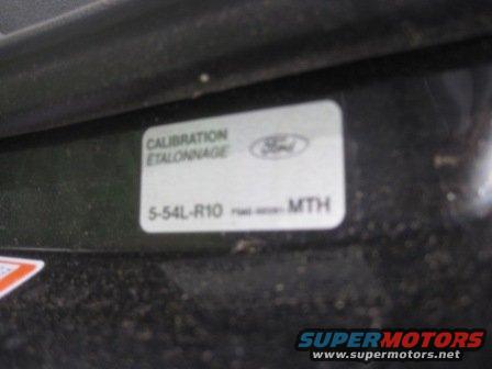 Ford calibration sticker with part number S-54L-R10 and MTH