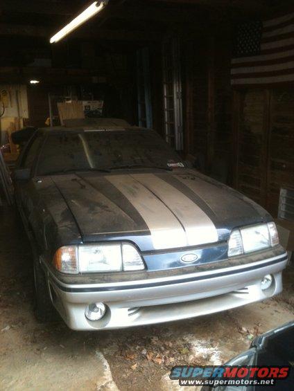 1990 Ford Mustang front view, dark blue with silver racing stripes