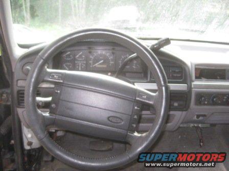 1993 Ford Bronco interior showing steering wheel and dashboard gauges