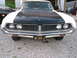 1971 Ford Ranchero - This 1971 Ford Ranchero features a distinctive two-tone paint scheme with a black hood and white body.