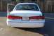 1997 Ford Crown Victoria - Mustang from the back with her VETERAN plates.