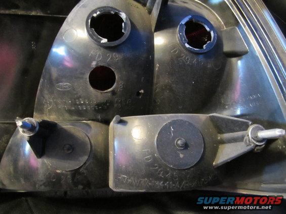Close-up of a car's taillight assembly, showing part numbers like FD 29 and FD 29.45