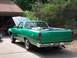 1971 Ford Ranchero - This 1971 Ford Ranchero displays its engine bay with the hood raised, viewed from the rear three-quarter angle.
