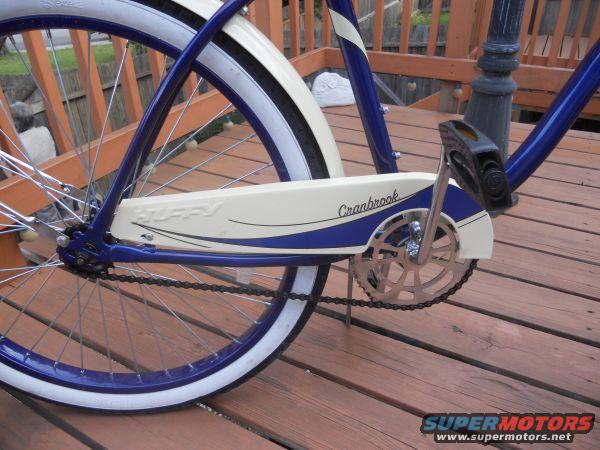 Blue and white bicycle chain guard with 'Huffy' and 'Cranbrook' text