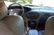 1998 Ford Taurus - Interior view of a 1998 Ford Taurus, showing the dashboard, steering wheel, and seating.
