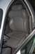 1998 Ford Taurus - The driver's seat of a 1998 Ford Taurus shows gray leather upholstery and a visible seatbelt.