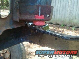 Vehicle frame part with red rubber bushing and SuperMotors logo