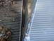 2003 Ford Taurus - Comparison of a dirty cabin air filter and a new one, likely for a vehicle maintenance task.