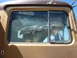 1959 Kenworth W900A - The interior of the truck cab is obscured by debris visible through the broken window.