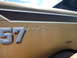 1959 Kenworth W900A - Side panel of a truck shows '57' and 'KENWORTH' lettering.