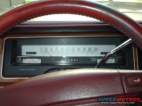 1991 Mercury Grand Marquis interior showing dashboard gauges, speedometer, and gear selector