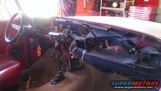 1978 Ford Bronco interior with dashboard disassembled, showing wires and vents