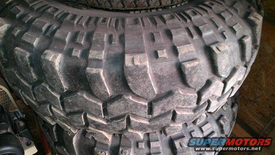 Close-up of a stack of aggressive off-road tires