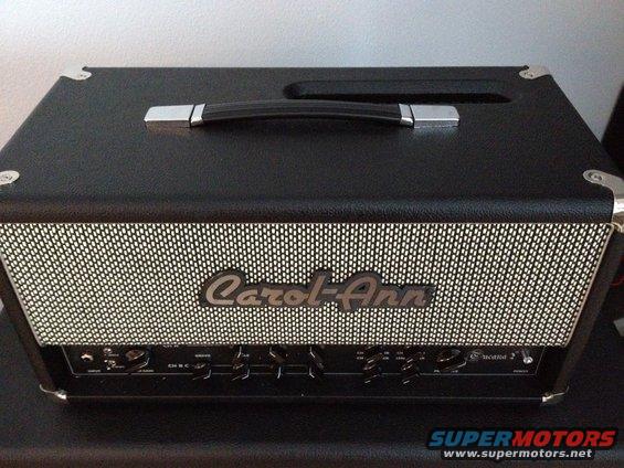 Black audio amplifier with 'Carol-Ann' logo and control knobs