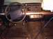 1991 Ford Crown Victoria - Interior view of a 1991 Ford Crown Victoria, showing the dashboard, steering wheel, and center console.