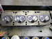 1967 Ford Mustang - Close-up view of an engine cylinder head, showing the intake and exhaust valves.