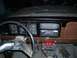 1978 Ford F-250 - The interior of a truck shows the dashboard with a steering wheel, instrument cluster, and dual radio setup.