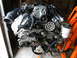 2004 Ford Crown Victoria - Ford SVT engine assembly, likely from a performance vehicle, mounted on an orange stand.