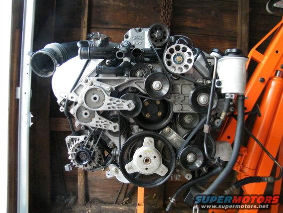 Ford 4.6L V8 engine with supercharger and many pulleys