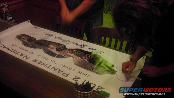 Poster shows a car with text '2 PANTHER NATIONAL JUNE 1ST-7TH 2012 BRANSON MO' and 'Ford Motor Company'