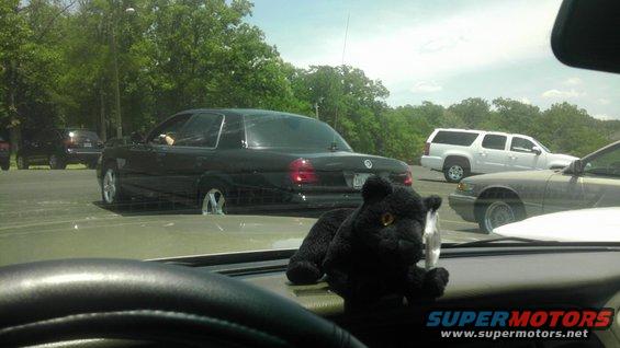 Black 2000 Mercury Grand Marquis, rear view