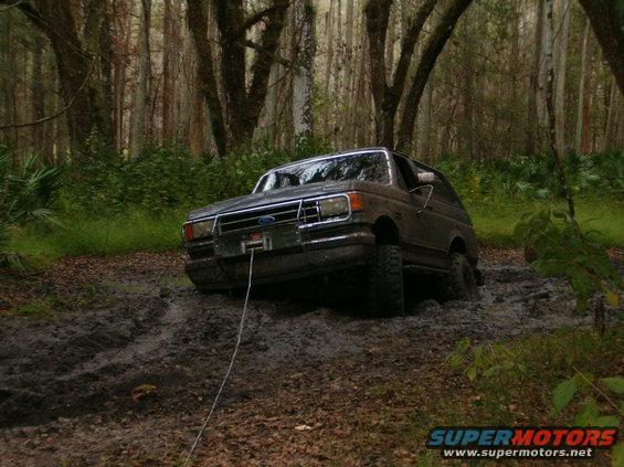 stuck2.jpg Sunk in pretty bad mud.  Had to try the winch, was winching when somebody came and offered to pull me.  Along with his 6in wide tow strap and somebody operating my winch I got out.  Had around 10 people watching and a FWC officer.  Was the second day of hunting season so many people around.  