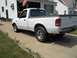 1970 Ford Ranchero - White Ford pickup truck parked on a concrete driveway.