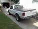 1970 Ford Ranchero - A white Ford Ranger pickup truck is parked in a driveway next to a garage.
