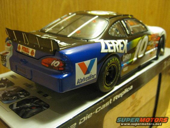 Die-cast race car model with blue and black livery, number 10, and sponsor decals