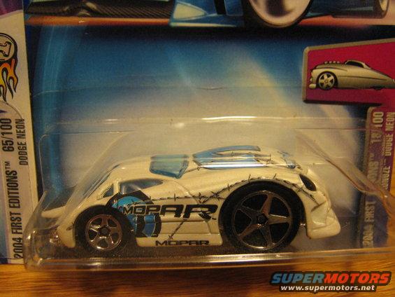 White toy car with blue Mopar graphics in packaging