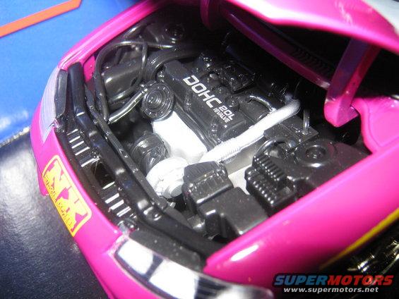 Model car engine bay with DOHC 2.0L 16 VALVE engine detail and "NK" sticker