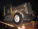 1959 Kenworth W900A - This 1959 Kenworth W900A is being transported on a flatbed trailer.