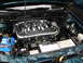 1992 Ford Taurus - Engine bay of a Ford SHO, the 24 valve DOHC engine and chrome intake.