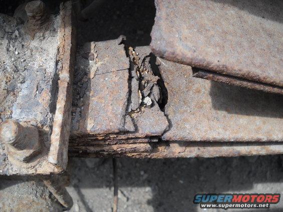 54-build--6292012-004.jpg 7-17-2012:  I think I found the reason the guy sold this truck.  Here's what's left of the driver side rear spring pack.